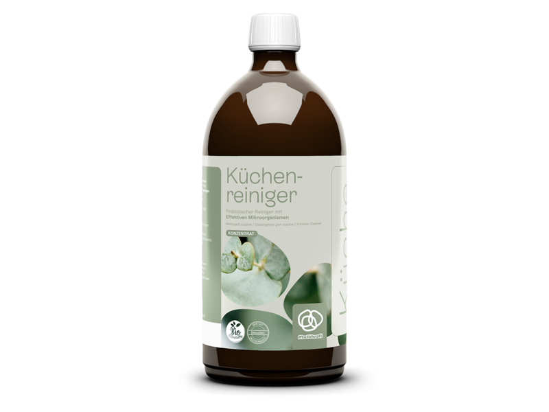 Freigestellte braune Flasche eines biologischen Küchenreinigers mit weiß-grünem Etikett.