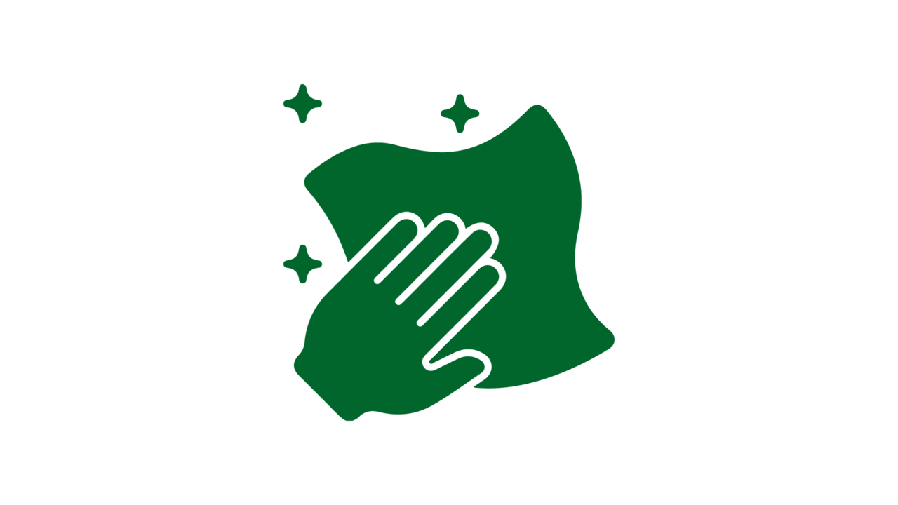 Grünes Icon-Symbol einer Hand, die mit einem Tuch eine Fläche sauber wischt.